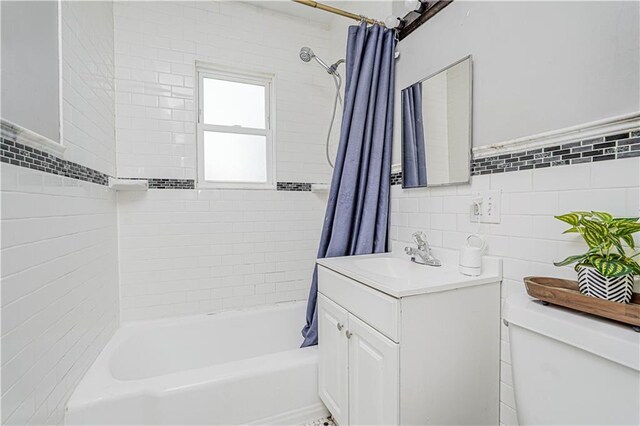 483 Van Duzer St, Staten Island, NY 10301 - bathroom with shower / bath combination with curtain, vanity, and tile walls