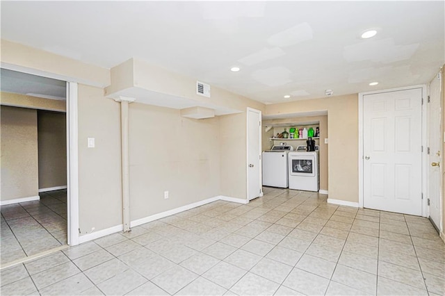 483 Van Duzer St, Staten Island, NY 10301 - unfurnished living room with independent washer and dryer, recessed lighting, and light tile patterned flooring