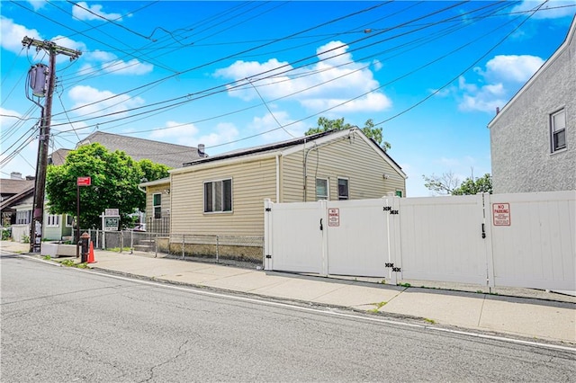 483 Van Duzer St, Staten Island, NY 10301 - view of front facade featuring a gate