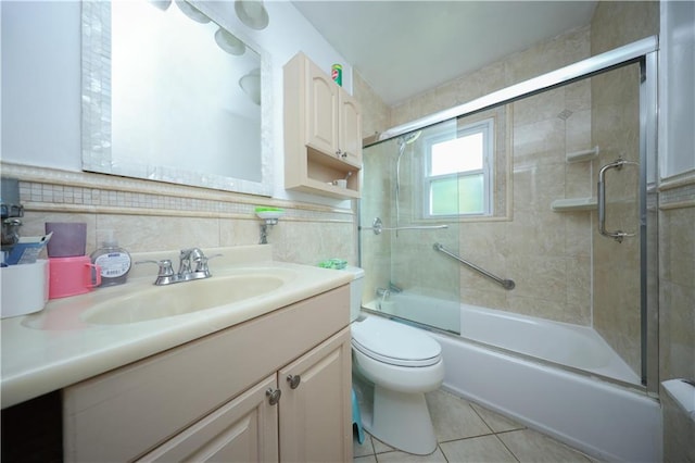 50 Glenwood Ave, Staten Island, NY 10301 - full bath with vanity, enclosed tub / shower combo, tile patterned floors, and tile walls
