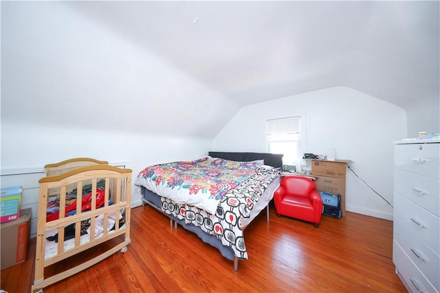 50 Glenwood Ave, Staten Island, NY 10301 - bedroom with vaulted ceiling and wood finished floors