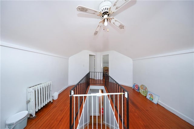 50 Glenwood Ave, Staten Island, NY 10301 - bonus room with radiator heating unit, lofted ceiling, ceiling fan, and wood finished floors