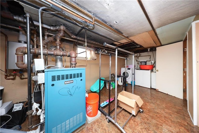 50 Glenwood Ave, Staten Island, NY 10301 - unfinished basement featuring washing machine and clothes dryer and a heating unit