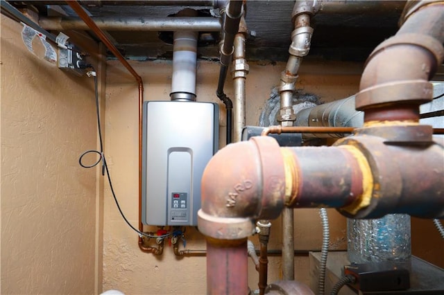 50 Glenwood Ave, Staten Island, NY 10301 - utility room featuring tankless water heater