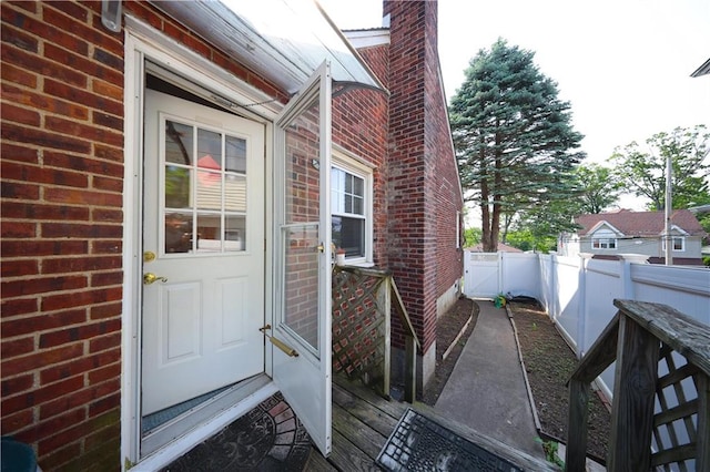 50 Glenwood Ave, Staten Island, NY 10301 - property entrance with brick siding and a chimney