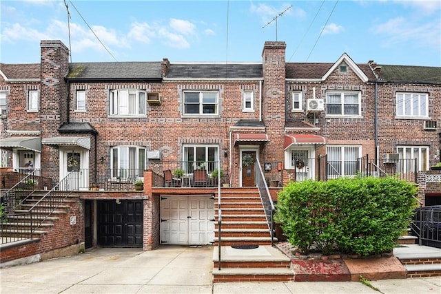 880 Bay Ridge Ave, Brooklyn, NY 11220 - townhome / multi-family property with driveway, brick siding, a garage, a chimney, and roof with shingles