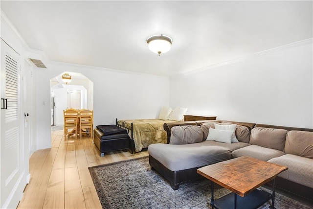 880 Bay Ridge Ave, Brooklyn, NY 11220 - bedroom with ornamental molding, light wood finished floors, and arched walkways