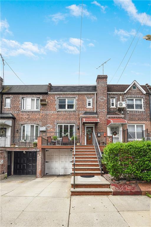 880 Bay Ridge Ave, Brooklyn, NY 11220 - view of property featuring driveway, an attached garage, and brick siding