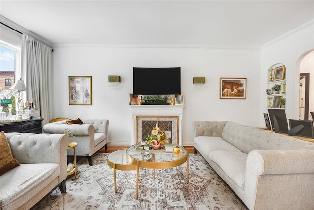 880 Bay Ridge Ave, Brooklyn, NY 11220 - living area with arched walkways, ornamental molding, a premium fireplace, and wood finished floors