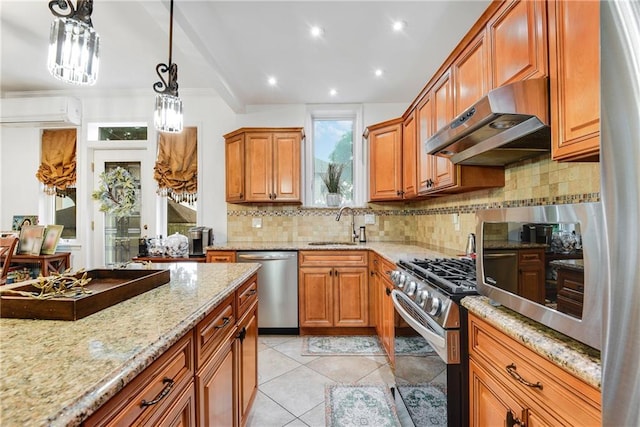 880 Bay Ridge Ave, Brooklyn, NY 11220 - kitchen featuring under cabinet range hood, stainless steel appliances, a wall mounted AC, light stone countertops, and decorative backsplash