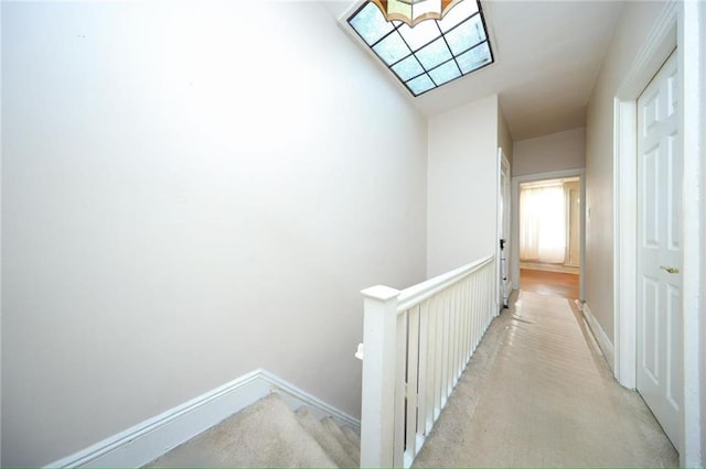 8669 15th Ave, Brooklyn, NY 11228 - hall featuring an upstairs landing and light carpet