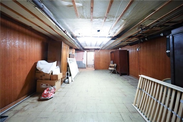 8669 15th Ave, Brooklyn, NY 11228 - unfinished basement with light floors and wooden walls