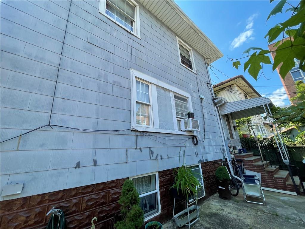55 Brighton 10th Ct, Brooklyn, NY 11235 - view of home's exterior with cooling unit