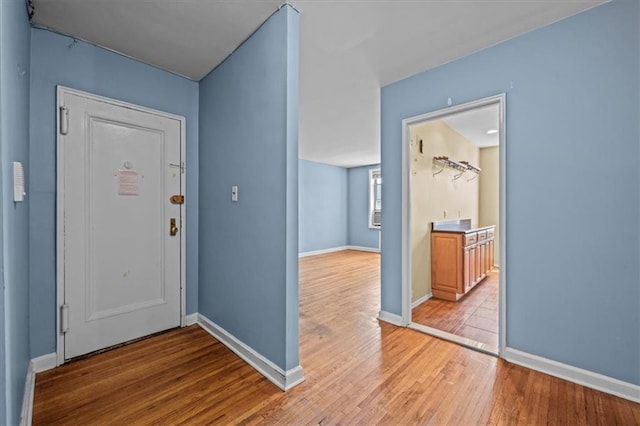 221 Mcdonald Ave Unit 6R, Brooklyn, NY 11218 - foyer featuring light wood-style floors and baseboards