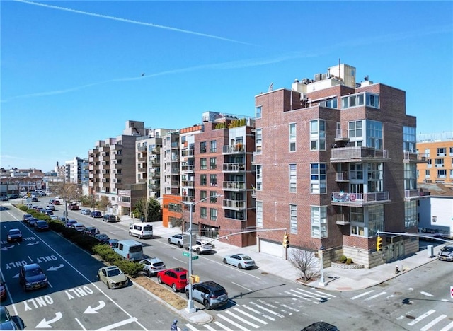 2784 E 12th St Unit 3, Brooklyn, NY 11235 - view of apartment building / complex featuring uncovered parking