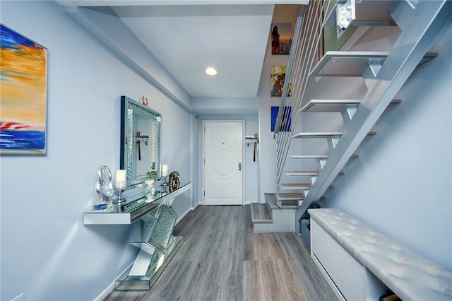 2784 E 12th St Unit 3, Brooklyn, NY 11235 - entrance foyer with stairway, wood finished floors, baseboards, and recessed lighting