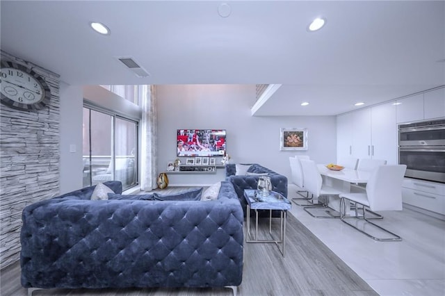 2784 E 12th St Unit 3, Brooklyn, NY 11235 - living room featuring recessed lighting