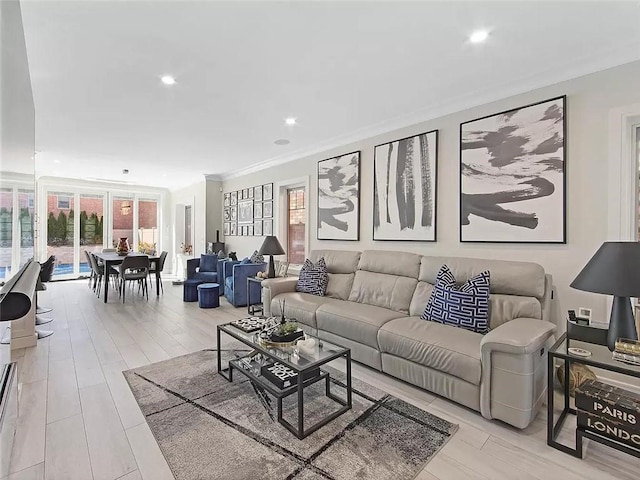 4906 21st Ave, East Elmhurst, NY 11370 - living room with wood finished floors, crown molding, and recessed lighting