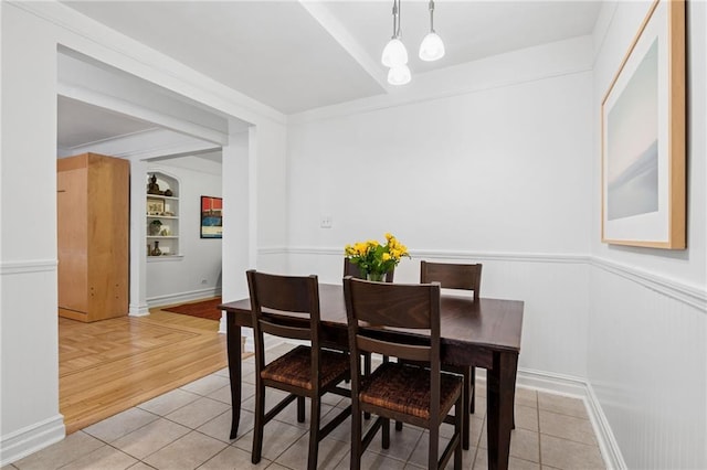 385 Argyle Rd Unit 4A, Brooklyn, NY 11218 - dining room featuring wainscoting and light tile patterned flooring