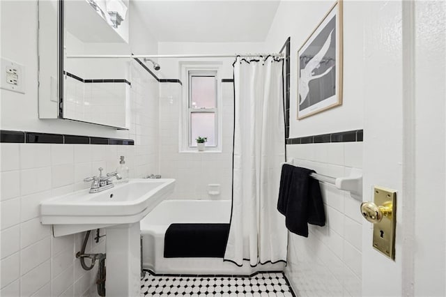385 Argyle Rd Unit 4A, Brooklyn, NY 11218 - bathroom with tile walls and shower / bath combo with shower curtain