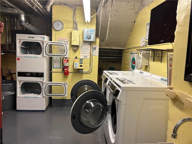 219 78th St Unit 2D, Brooklyn, NY 11209 - washroom featuring stacked washer and clothes dryer and washing machine and dryer