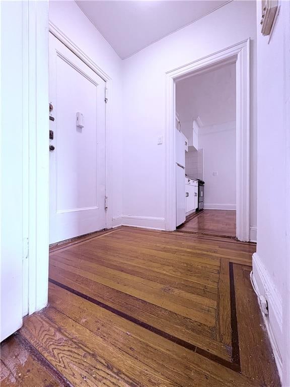 219 78th St Unit 2D, Brooklyn, NY 11209 - entryway featuring hardwood / wood-style flooring and baseboards
