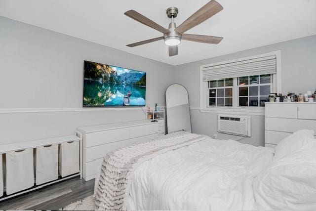 400 Maryland Ave Unit 2D, Staten Island, NY 10305 - bedroom with wood finished floors, a wall mounted AC, and a ceiling fan