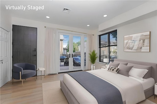 1206 E 9th St, Brooklyn, NY 11230 - bedroom with access to outside, light wood-style floors, french doors, and recessed lighting
