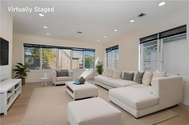 1206 E 9th St, Brooklyn, NY 11230 - living area with recessed lighting, light wood-type flooring, and baseboards