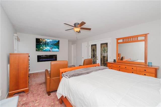 5 Haywood St, Staten Island, NY 10307 - bedroom with carpet, a glass covered fireplace, french doors, baseboards, and ceiling fan