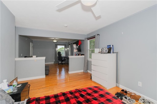 5 Haywood St, Staten Island, NY 10307 - living area featuring an office area, a ceiling fan, wood finished floors, and baseboards