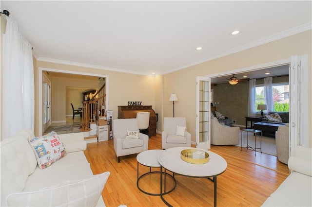 5 Haywood St, Staten Island, NY 10307 - living area featuring stairway, ornamental molding, light wood-style flooring, recessed lighting, and baseboards