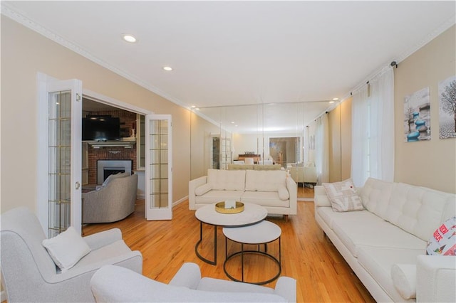 5 Haywood St, Staten Island, NY 10307 - living room with crown molding, wood finished floors, a fireplace, and recessed lighting