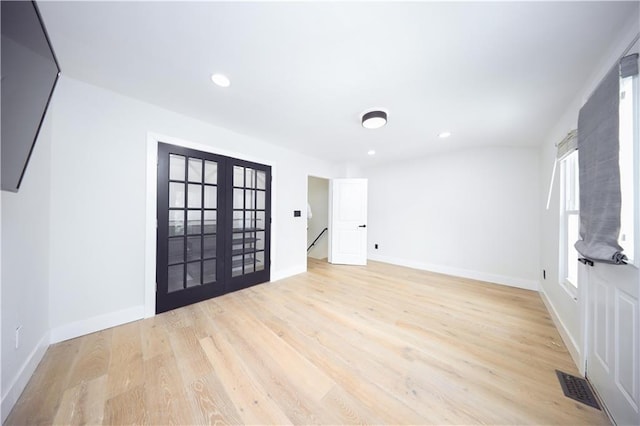 542 Golfview Ct Unit 1, Staten Island, NY 10314 - empty room with french doors, light wood finished floors, baseboards, and recessed lighting