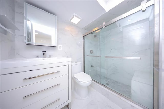 542 Golfview Ct Unit 1, Staten Island, NY 10314 - full bathroom with marble finish floors, vanity, toilet, and a marble finish shower