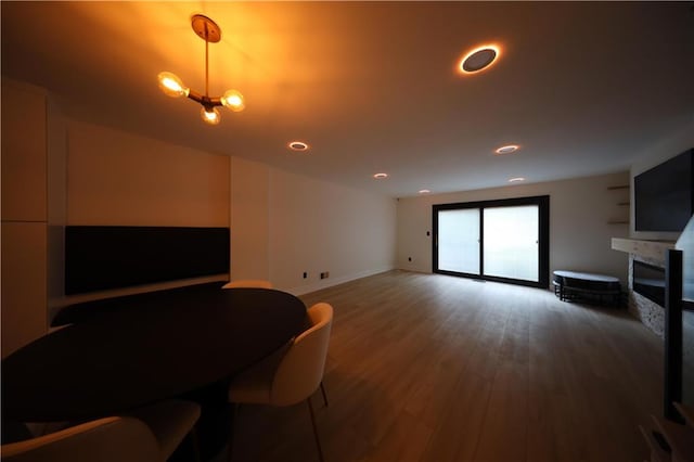 542 Golfview Ct Unit 1, Staten Island, NY 10314 - dining area with a fireplace, wood finished floors, baseboards, and recessed lighting
