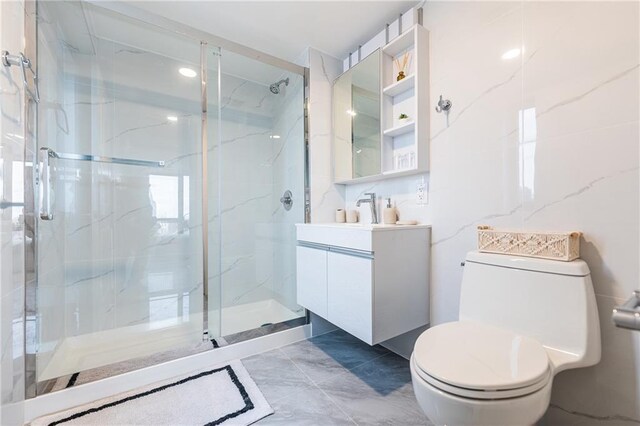 811 45th St Unit 5B, Brooklyn, NY 11220 - bathroom featuring a marble finish shower and vanity