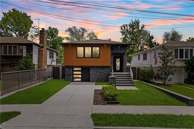 164 Railroad St, Staten Island, NY 10312 - view of front of home with concrete driveway and a garage