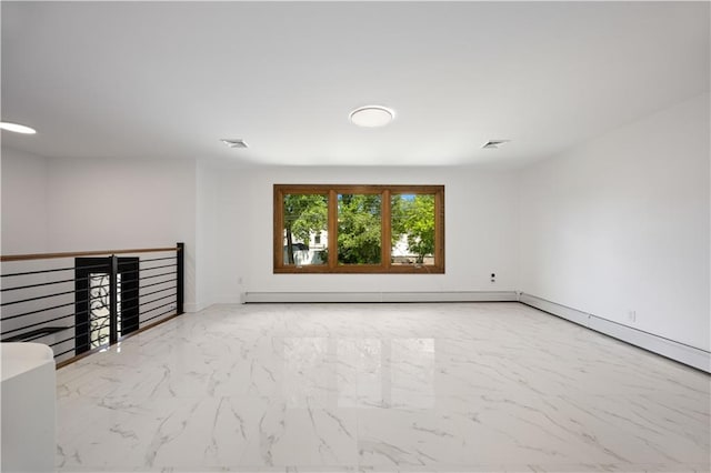 164 Railroad St, Staten Island, NY 10312 - empty room featuring marble look tiles and baseboards