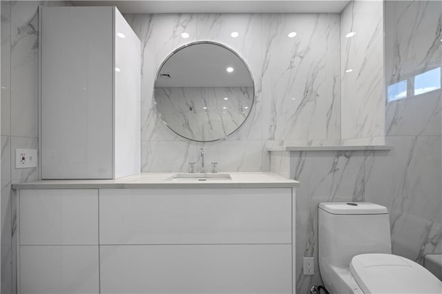 164 Railroad St, Staten Island, NY 10312 - bathroom with tile walls, vanity, and toilet