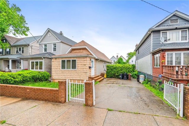 1347 E 57th St, Brooklyn, NY 11234 - view of front of house featuring a fenced front yard and a gate
