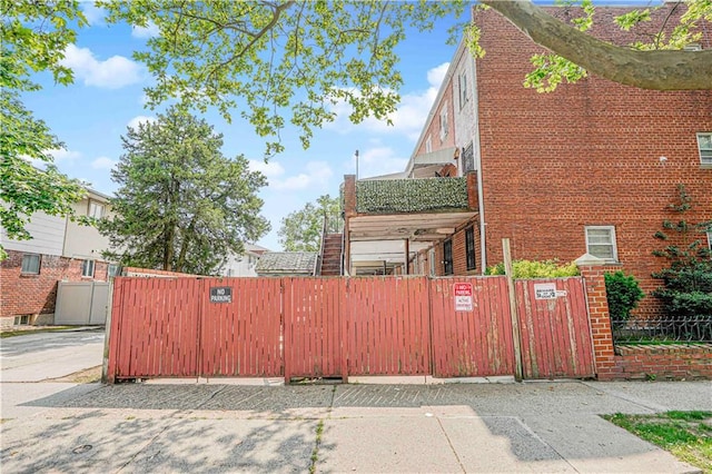 2701 Mill Ave, Brooklyn, NY 11234 - view of home's exterior featuring a gate and brick siding