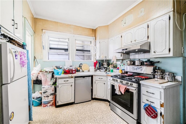 1642 E 22nd St, Brooklyn, NY 11210 - kitchen with under cabinet range hood, stainless steel appliances, ornamental molding, light countertops, and a sink