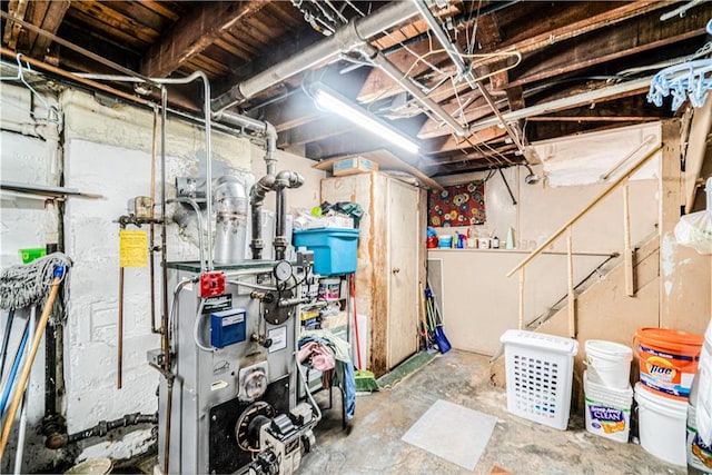 1642 E 22nd St, Brooklyn, NY 11210 - unfinished below grade area with a heating unit