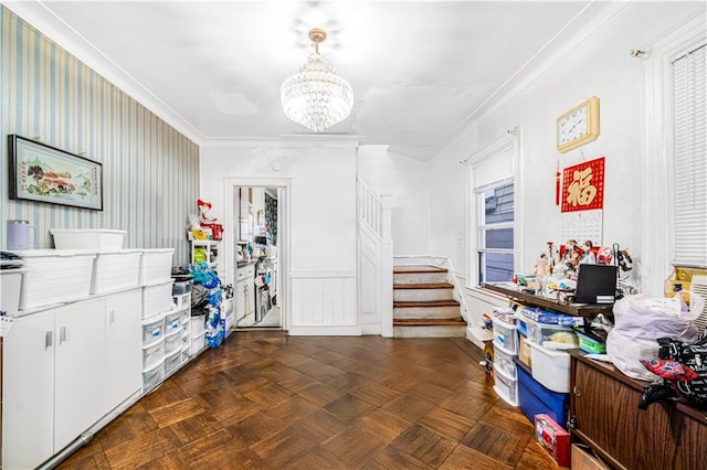 1642 E 22nd St, Brooklyn, NY 11210 - miscellaneous room with stairs, a chandelier, ornamental molding, and a wainscoted wall