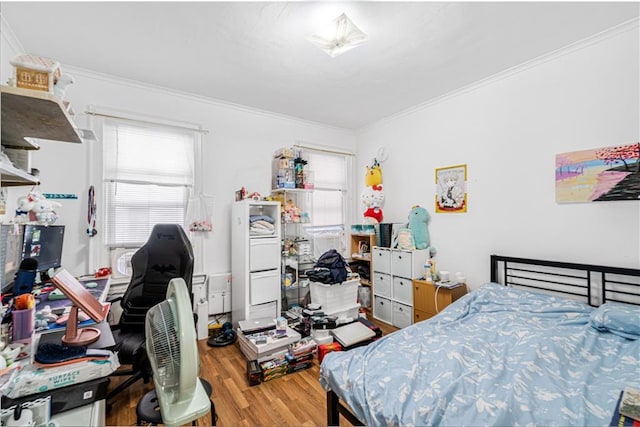 1642 E 22nd St, Brooklyn, NY 11210 - bedroom with crown molding, wood finished floors, and a desk