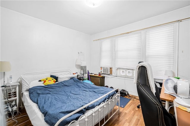 1642 E 22nd St, Brooklyn, NY 11210 - bedroom with wood finished floors and a desk
