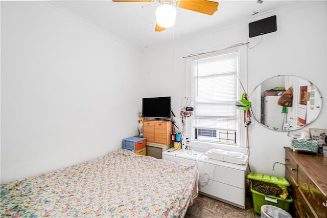 1642 E 22nd St, Brooklyn, NY 11210 - bedroom with washing machine and clothes dryer, ornamental molding, and ceiling fan