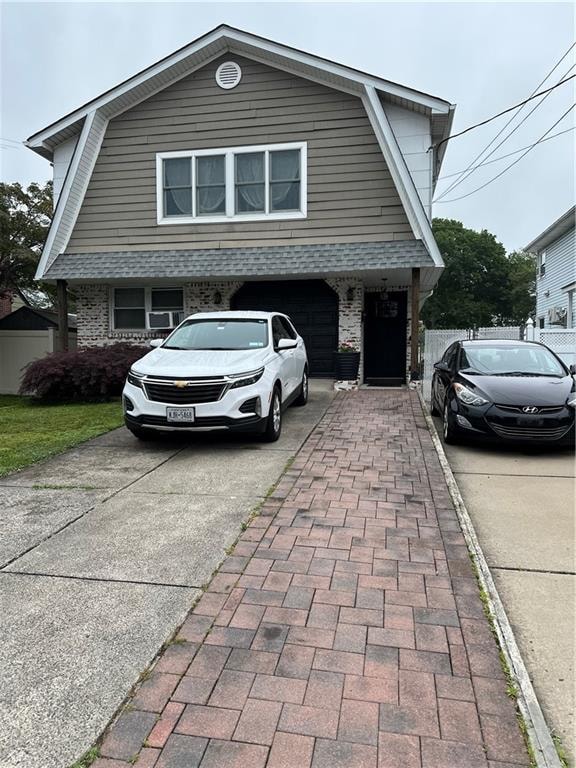 311 Giffords Ln, Staten Island, NY 10308 - colonial inspired home with a gambrel roof and driveway