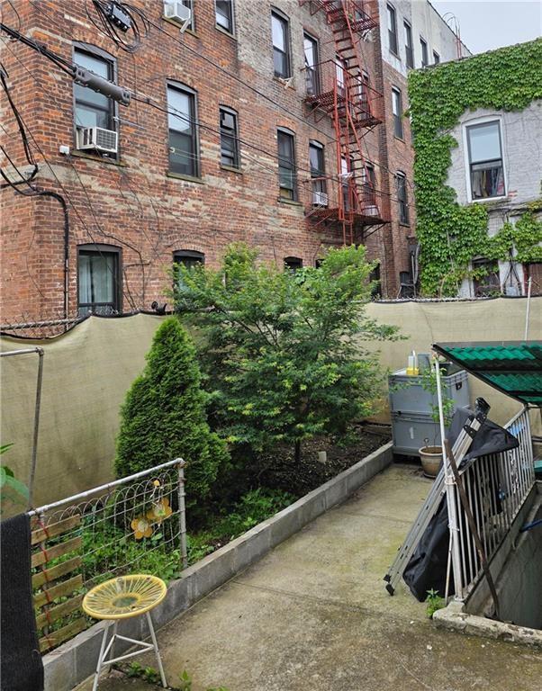 1812 80th St, Brooklyn, NY 11214 - view of apartment building / complex featuring cooling unit